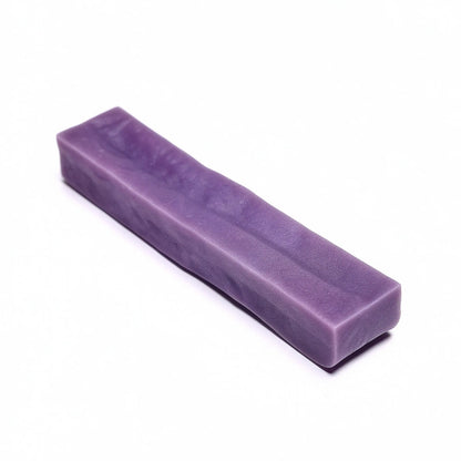 Blueberry dog yak chew on a white background
