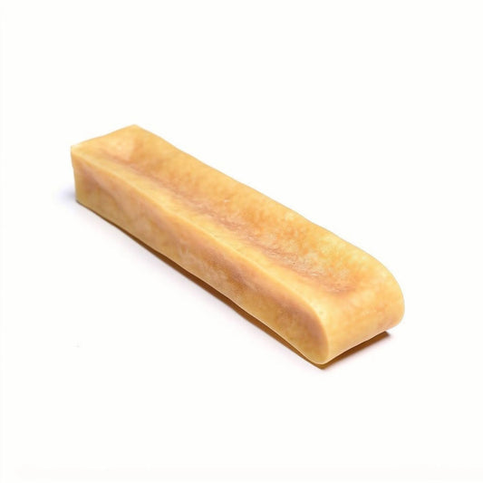 Rectangular dog yak chew treat on a white background